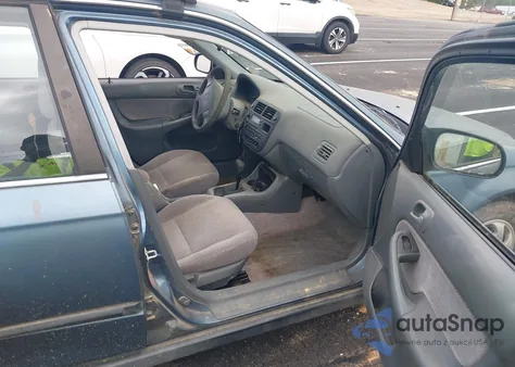 1997 Honda Civic Lx from USA, damaged, VIN 1HGEJ6673VL013634